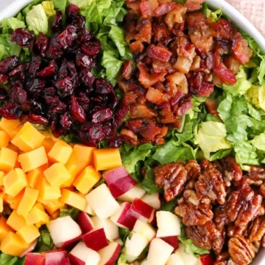 Cozy autumn chopped salad with seasonal ingredients and vibrant colors.