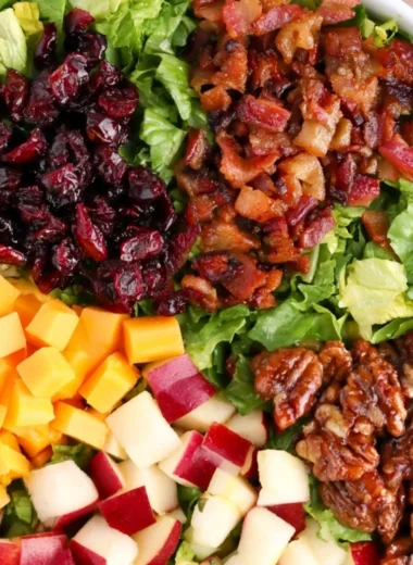 Cozy autumn chopped salad with seasonal ingredients and vibrant colors.