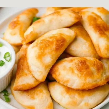 Crispy air fryer frozen pierogies served with sour cream and chives.