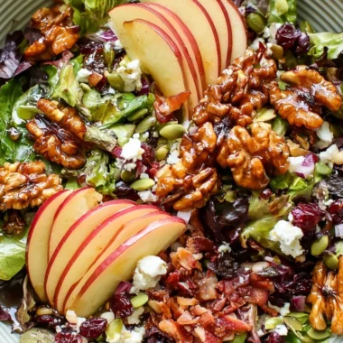 Cozy apple walnut salad with fresh apples and walnuts in a bowl