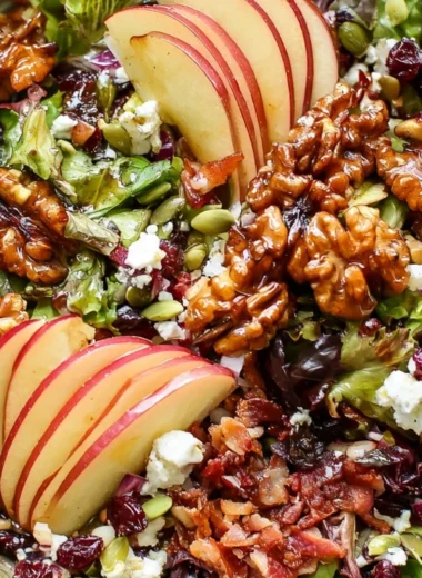 Cozy apple walnut salad with fresh apples and walnuts in a bowl