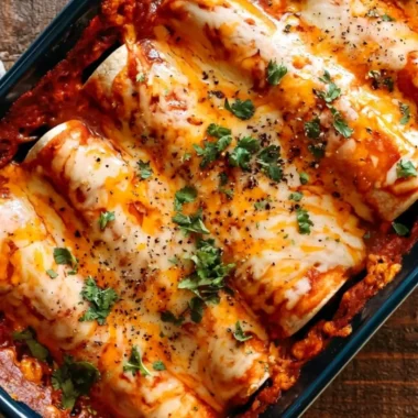 Delicious cozy bean and cheese enchiladas topped with melted cheese