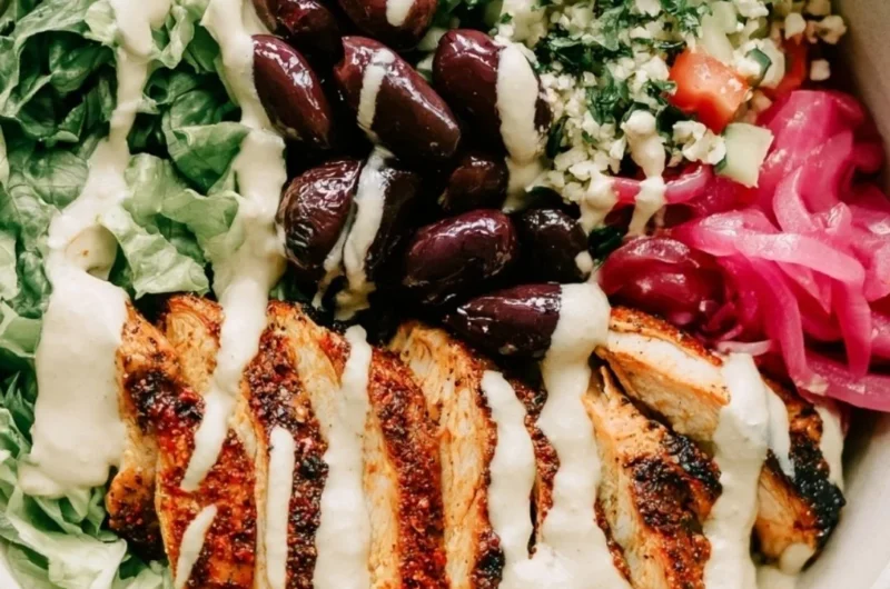 Cozy chicken shawarma meal prep bowls with fresh ingredients and spices.