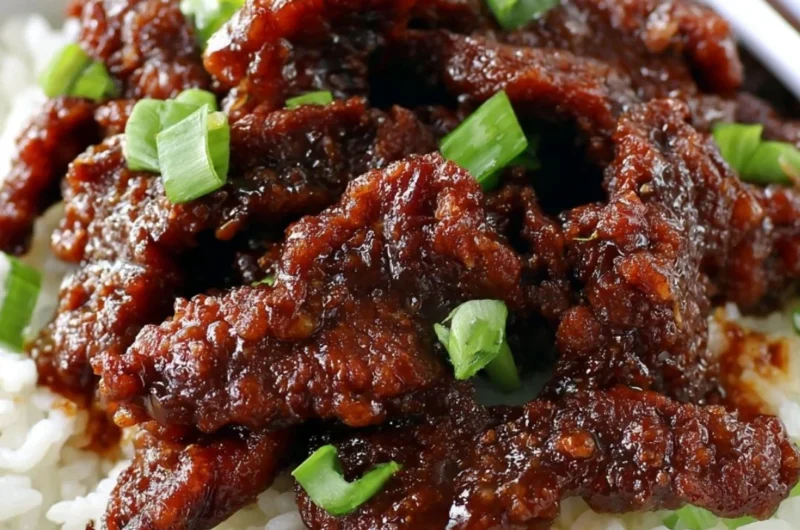 Delicious gluten-free Mongolian Beef served with rice and vegetables.