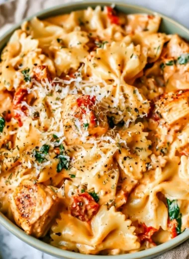 Delicious Marry Me Chicken Pasta served in a bowl with herbs and parmesan.