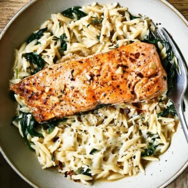 One Skillet Salmon served with Lemon Orzo in a vibrant dish
