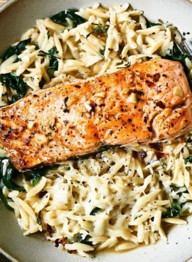 One Skillet Salmon served with Lemon Orzo in a vibrant dish