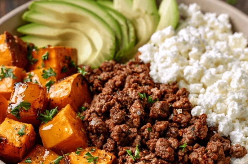 Delicious hot honey sweet potato beef bowls topped with fresh herbs.